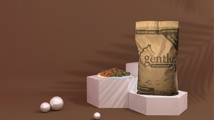 A bag of dog food on a platform with a brown background 